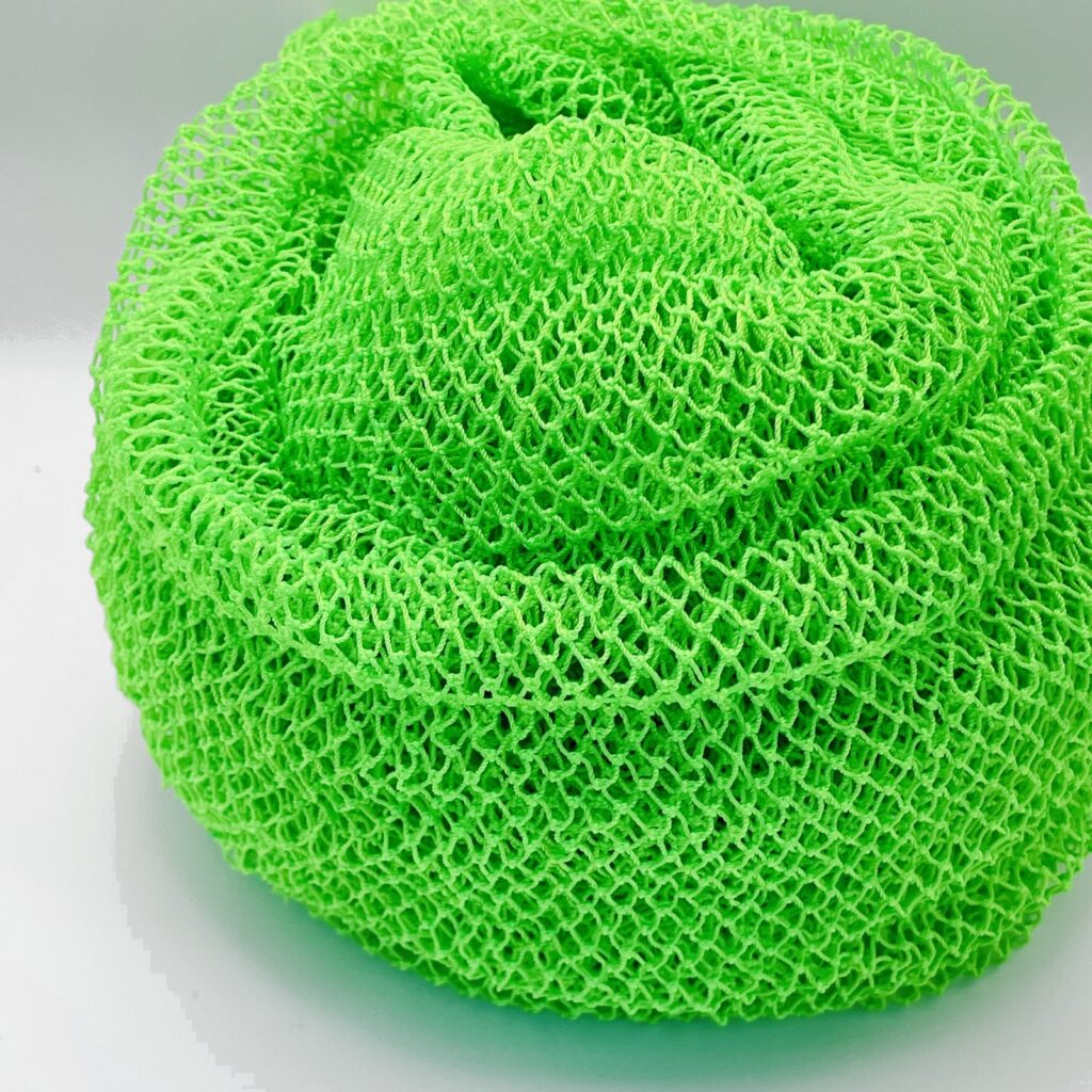 Green sapo sponge, African net sponge, natural exfoliating scrubber