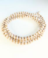 Elegant gold and cream African waist beads